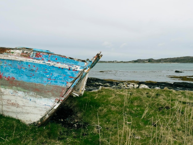 FISHERMAN39S WOODEN BOAT ABANDONED ON THE SHORE