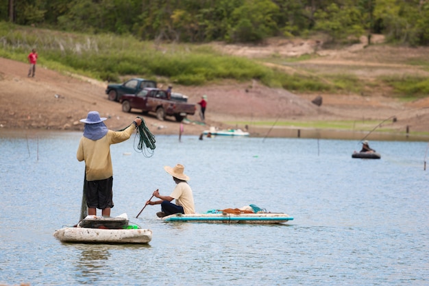 Fishermen fishing at the river