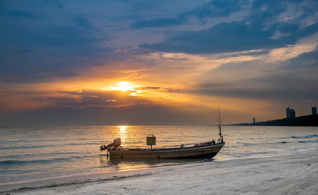 Fishery boat with warm lighting sunset sky