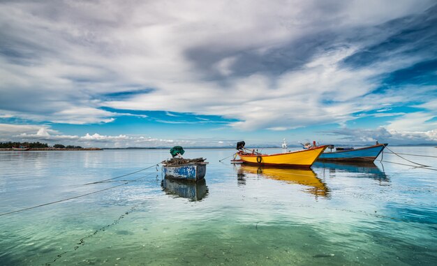 Fishery wooden boats in the sea