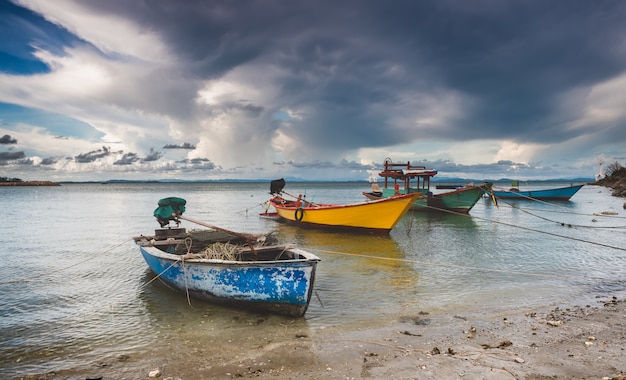 Fishery wooden boats with outdoor sun lighting