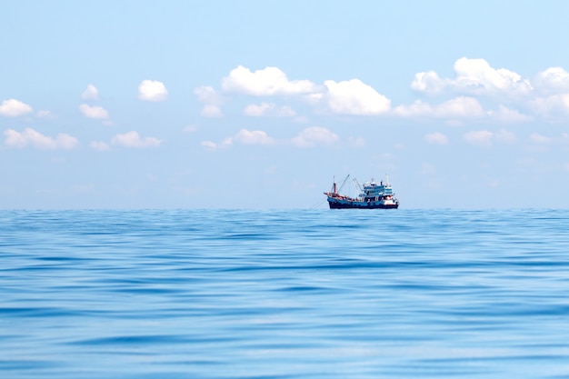 Fishing boat alone in the sea