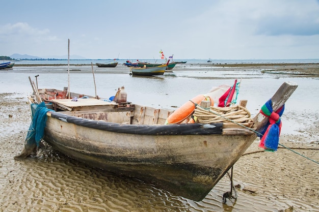 fishing boat moored on the beach