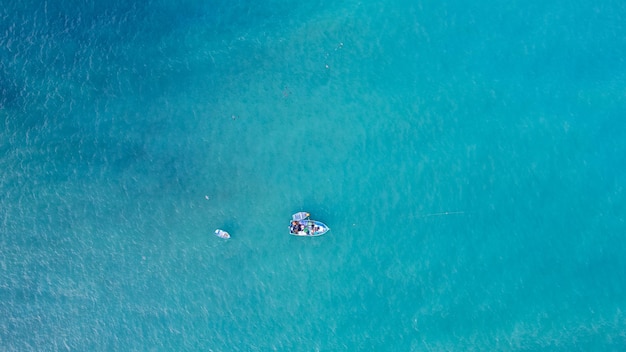 Fishing boat on the turquoise sea