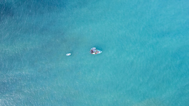 Fishing boat on the turquoise sea