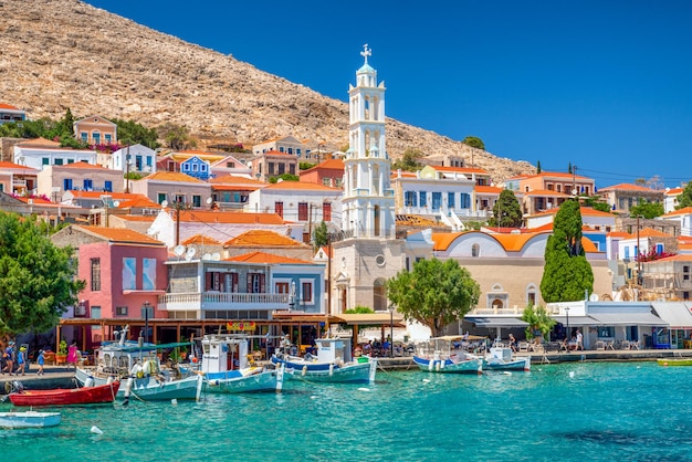 Fishing boats in harbor in island Halki Chalki in Greece