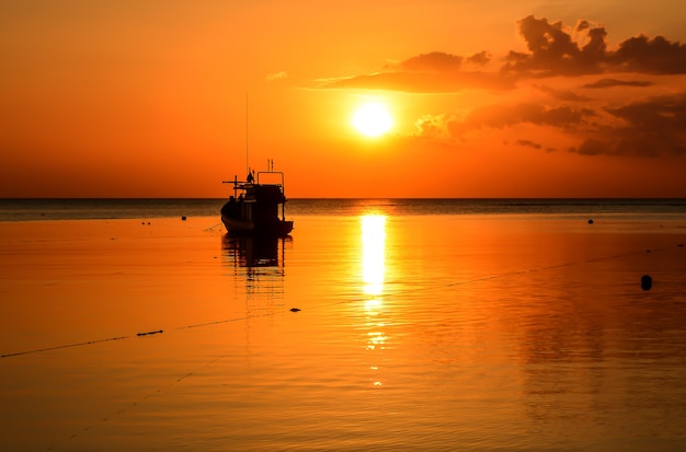 Fishing boats in harbour at sunset, phuket,thailand