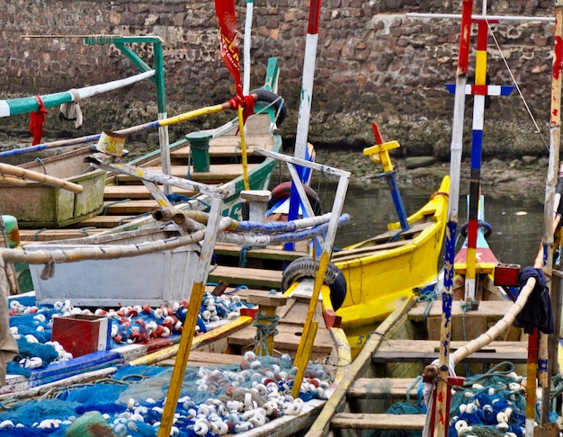 Photo fishing boats moored at port