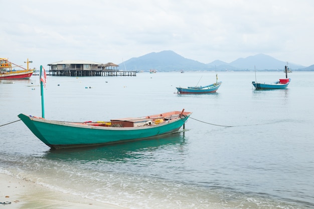 Fishing boats moored at the shore.