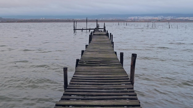 Fishing boats near wooden piers in an old fishing village in Varna Bulgaria