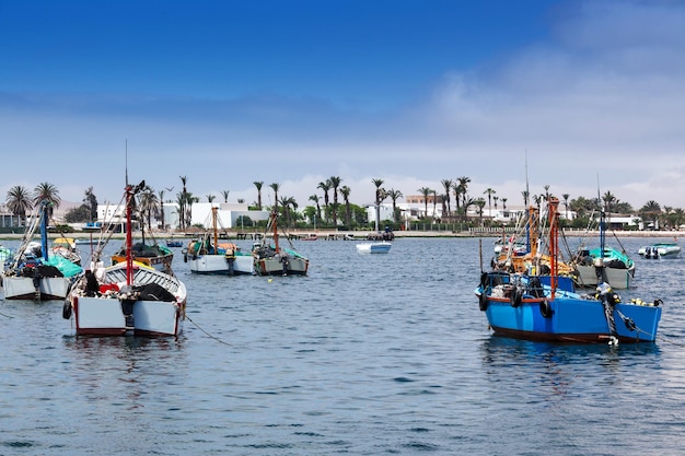 Fishing boats in ocean bay