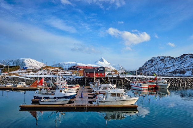 Fishing boats and yachts on pier in Norway