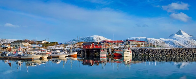 Fishing boats and yachts on pier in norway