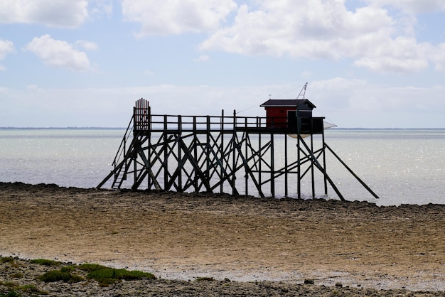 Fishing hut wooden in low tide water sea SaintPalaissurMer