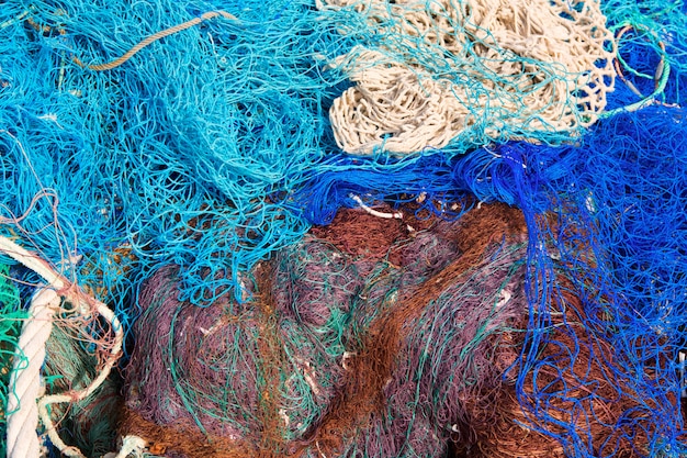 fishing nets pattern mess stacked at port