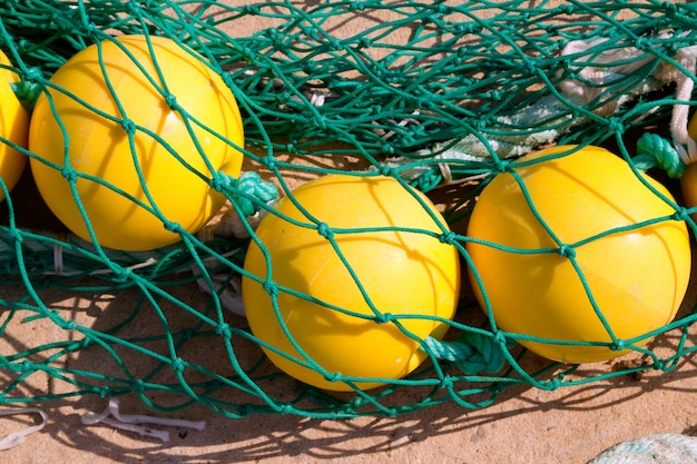 fishing nets woth yellow buoy