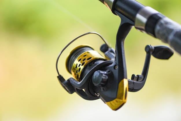 Fishing reel on fishing rod closeup