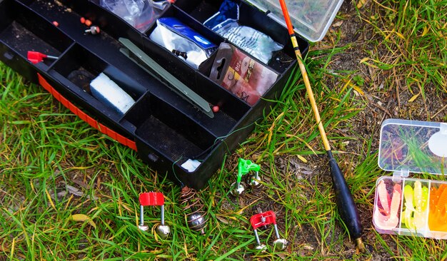 Fishing rod and accessories for fishing on the grass