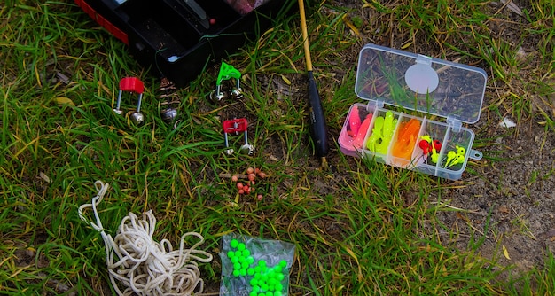 Fishing rod and accessories for fishing on the grass