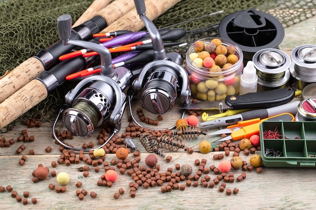 Fishing rods and spinnings on a table