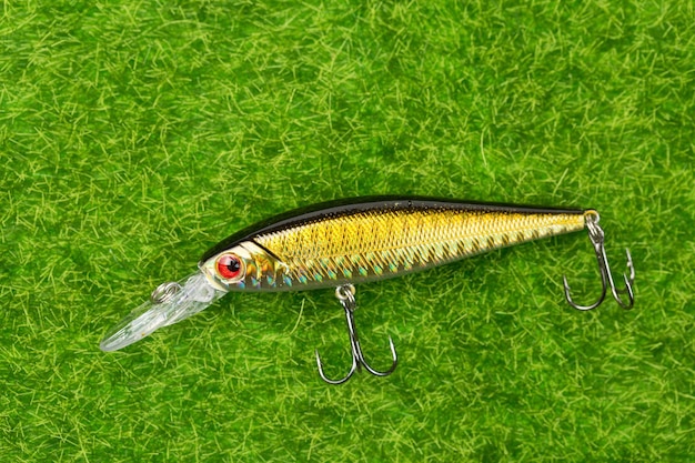 Fishing spinners and wobblers multi-colored on background