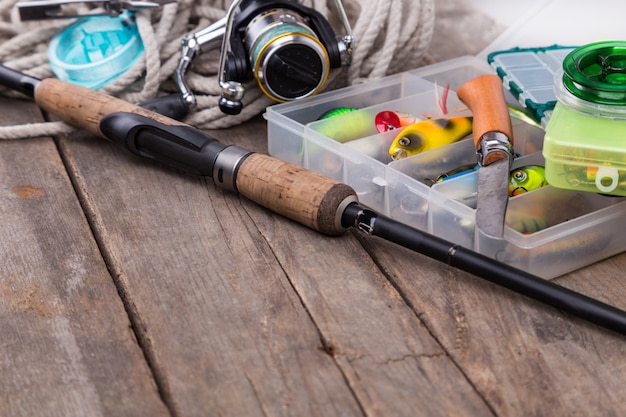 Fishing tackles and baits in storage boxes