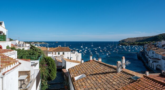 Fishing village with boats anchored in the bay