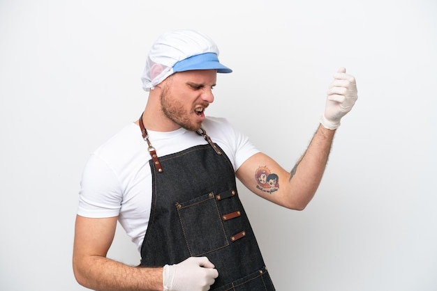 Fishmonger man wearing an apron isolated on white background making guitar gesture