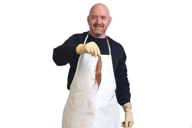 Fishmonger showing a prawns on white background