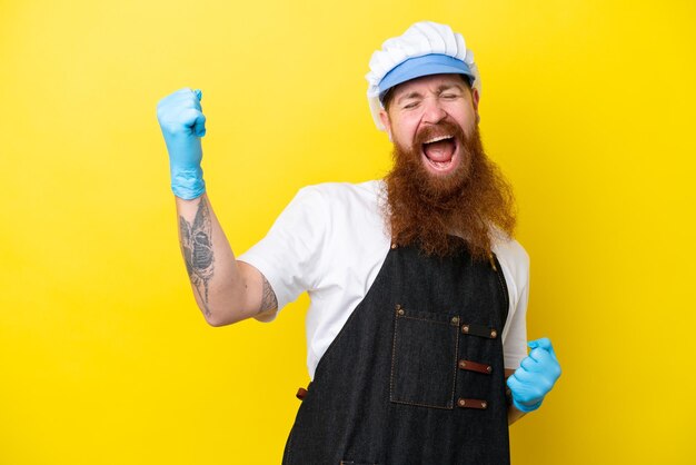 Fishmonger wearing an apron isolated on yellow background making guitar gesture