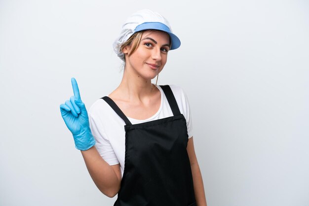 Fishwife woman isolated on white background showing and lifting a finger in sign of the best