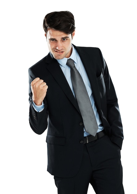 Fist pump celebration portrait and business man celebrate corporate victory winning achievement or profit success Winner pride bonus salary and cocky studio lawyer or salesman on white background