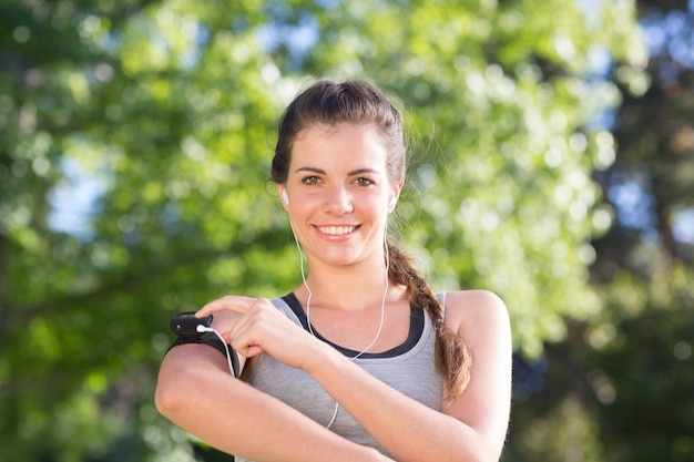 Fit brunette on a run in the park