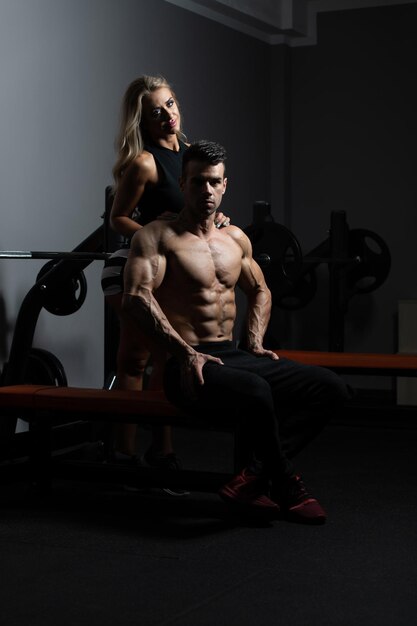 Fit Couple Together Training Chest With Weights