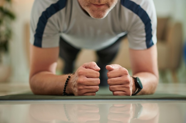 Fit Man Doing Plank Exercise