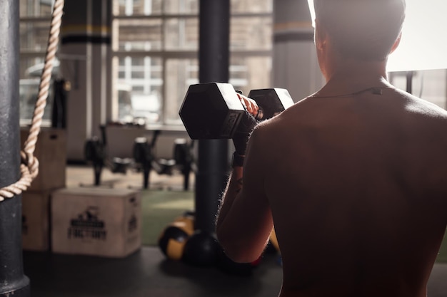 Fit man in gym working out