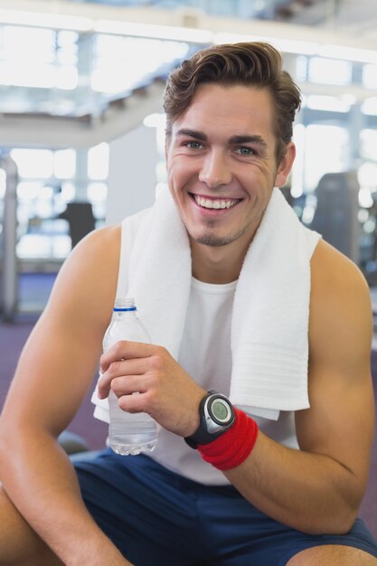 Fit man taking a break from working out