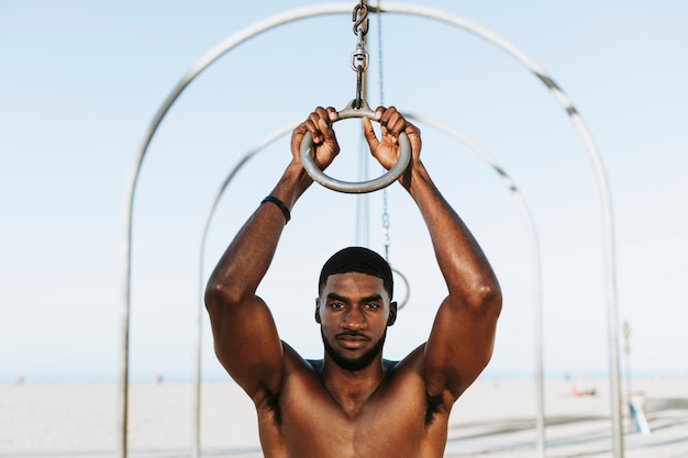 Fit man working out at the beach