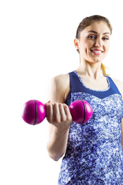 Photo fit woman lifting pink dumbbell