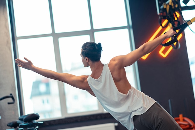 Fit young man having a strength training