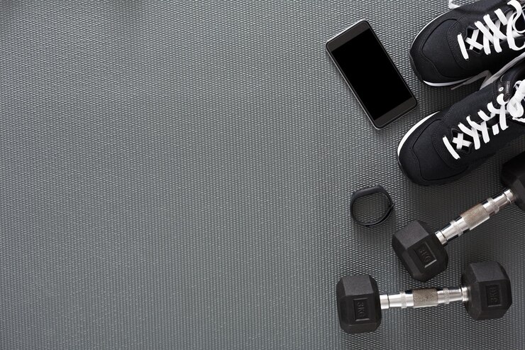 フィットネスの背景、トレーニングや衣装のための男性のスポーツ用品、コピースペース。減量、健康的なライフスタイルのコンセプト