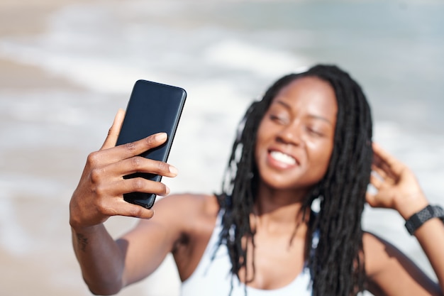 Fitness Blogger Filming Video on Smartphone