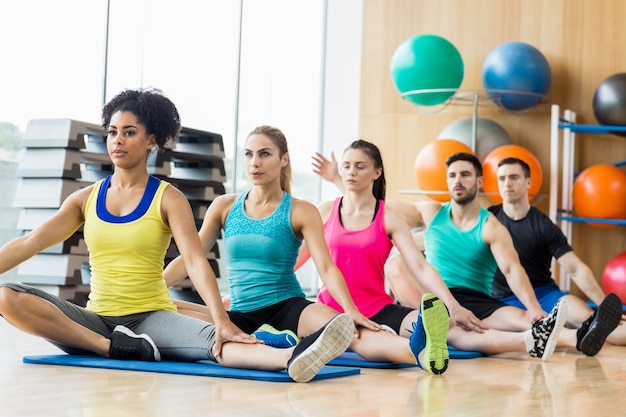 Fitness class exercising in the studio