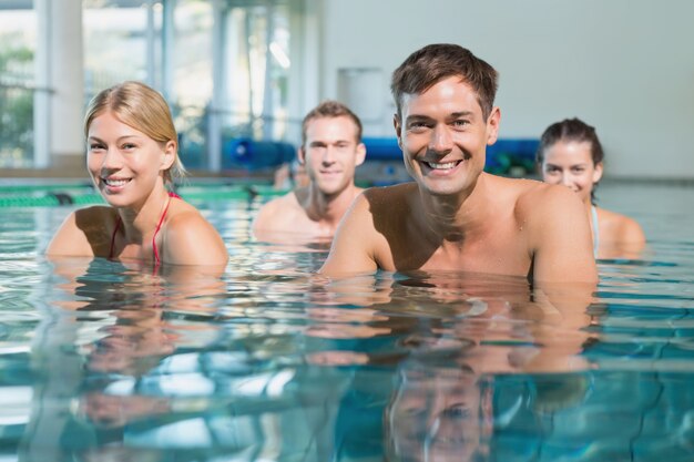 Fitness class using underwater exercise bikes