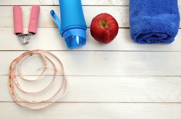 Fitness concept with sport set, drinking bottle 