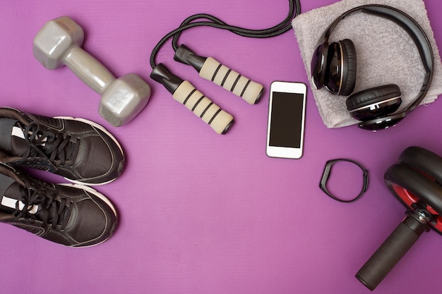 Fitness equipment on purple mat