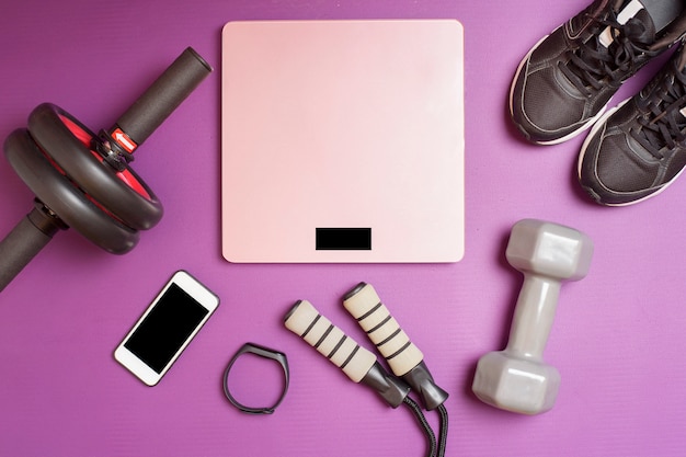 Fitness equipment on purple mat