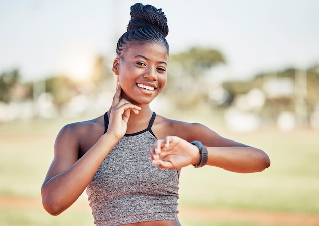 Fitness exercise and black woman check pulse after running athletics and workout in sports stadium Health wellness and portrait of female athlete monitor heart rate with hand on neck in training