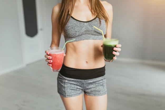 fitness girl drinking fruit juice