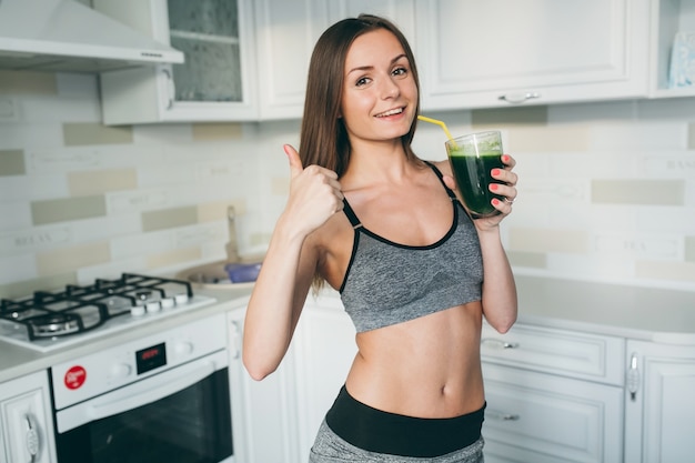 fitness girl drinking fruit juice